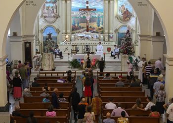 Parishioners take communion at Mass / Photo courtesy of the author