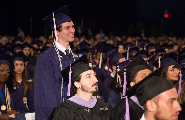 Edgar Sanfeliz-Botta (standing). Photo: Florida International University/Facebook.