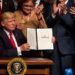 Donald Trump displays the presidential memorandum about the policy toward Cuba at the end of his speech at Little Havana’s Manuel Artime Theater, in Miami. Photo: Cristobal Herrera / EFE.