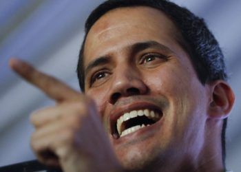 The self-proclaimed interim president of Venezuela, Juan Guaidó, talking during a meeting with experts in electricity in Caracas, Venezuela, on Thursday, March 28, 2019. (AP Photo/Natacha Pisarenko)