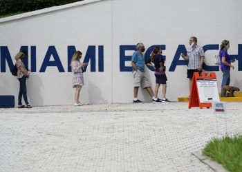 A line at a voting center in Miami Beach | Lynne Sladky / AP