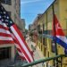 Cuban and U.S. flags on the facade of the La Moneda Cubana Restaurant in Havana. Photo: Yamil Lage/AFP/Getty Images.