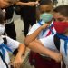 Three children greet each other before entering their school. Photo: Otmaro Rodríguez/Archive.