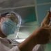 A nurse prepares a dose of the Abdala COVID-19 vaccine candidate, in Cienfuegos, Cuba. Photo: Otmaro Rodríguez.