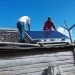 Installation of solar panels in a rural house in Cuba. Photo: Radio Reloj/Archive.