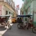 Pedicabs on a street in Havana. Photo: Otmaro Rodríguez