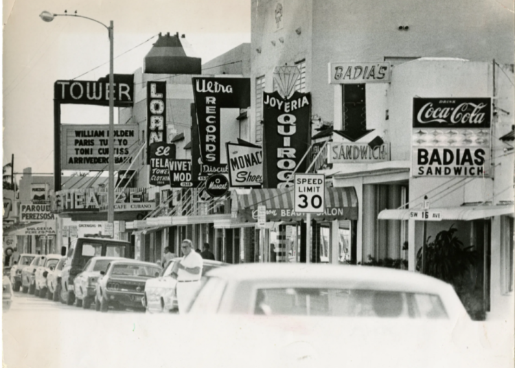 Featured in this photo is a section of Southwest Miami’s 8th Street, known as Calle Ocho, including a variety of stores and the Tower Theater with movie titles in Spanish. This photograph appeared in the Miami News on January 21, 1972. RICHARD GARDNER, at the History Miami Museum.