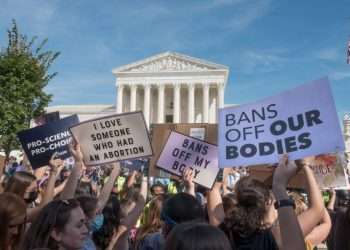 Right to abortion supporters march in front of the Supreme Court during the Women’s March on Washington on Oct. 2, 2021. (Bob Korn via Shutterstock)