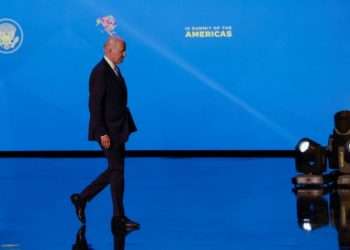 U.S. President Joe Biden walks at the stage during the ninth Summit of the Americas, in Los Angeles, California, U.S. June 8, 2022. REUTERS/Daniel Becerril