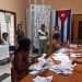 Members of a polling station carry out the vote count, at the close of electoral day, in Havana. Photo: Ernesto Mastrascusa/EFE.