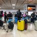 Cubans in line at the Havana airport. Migration in Cuba