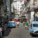 People walk down a street in downtown Havana. Photo: Yander Zamora/EFE.