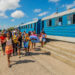 Passengers get off the train to the beaches east of Havana, upon arriving at the Guanabo train station. Photo: Otmaro Rodríguez.