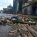 Debris falling from a building on Monte Street in Havana, as a result of the ravages of Hurricane Rafael. Photo: Otmaro Rodríguez.