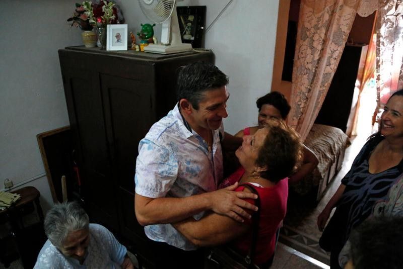 Richard Blanco, on a previous trip, with his family in Cuba. Photo: Desmond Boylan / AP.