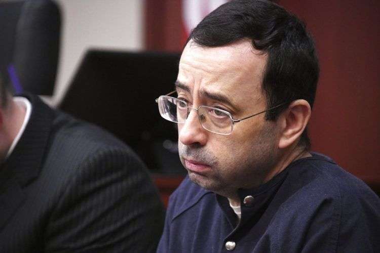 Larry Nassar, el médico del equipo de gimnasia acusado de abuso sexual, en el tribunal de Lansing, Michigan, el 23 de enero de 2018. Foto: Dale G.Young / Detroit News vía AP.