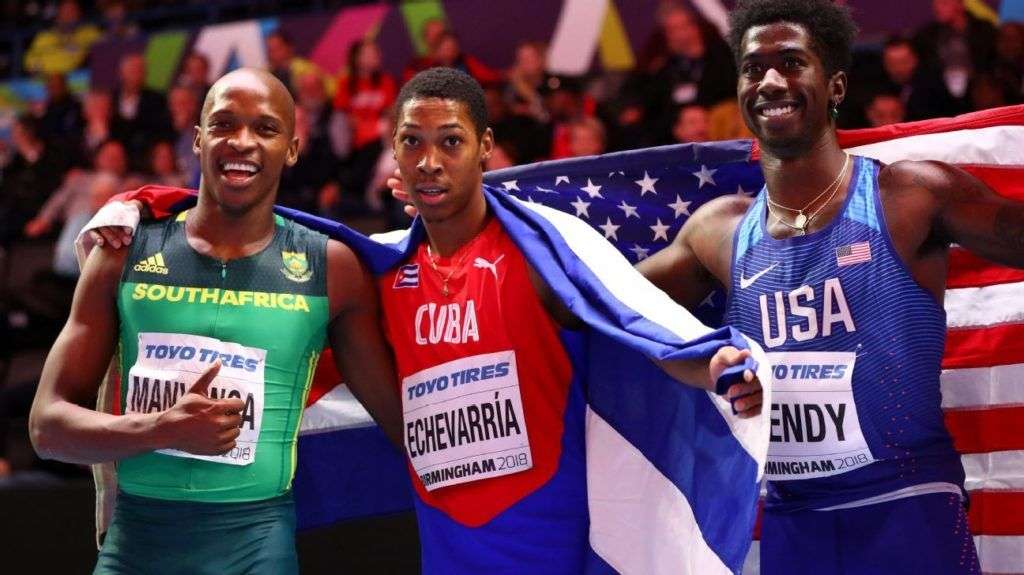 Cuban Long Jump´s athlete Juan Miguel Echevarría (center) after winning the World Championship in Birmingham, England. Next to him: southafrican Luvo Manyonga (left), silver medal, and north-american Marquis Dendy (right), bronze. Photo: ESPN.