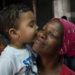 Milagros García y su hijo Dylan, de 3 años, a un mes del tornado que destruyó su casa en la barriada de Luyanó, en La Habana. Foto: Otmaro Rodríguez.