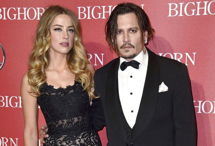 En esta fotografía del 2 de enero de 2016, Amber Heard y Johnny Depp durante un evento en Palm Springs, California. Foto: Jordan Strauss/Invision/AP.