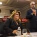 La comisionada Jenniffer González se sienta mientras el presidente del Senado de Puerto Rico, Thomas Rivera Schatz, habla previo a una reunión privada con legisladores y alcaldes en San Juan, el jueves 8 de agosto de 2019. (AP Foto/Dennis M. Rivera Pichardo)