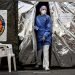 Una paramédica sale de una carpa montada por Proteccion Civil, el jueves 27 de febrero de 2020, en el hospital de Plasencia, Italia. Foto: Claudio Furlan/AP.