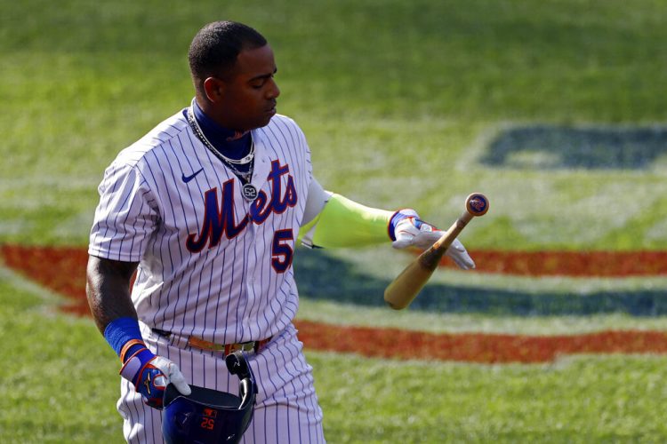 Yoenis Céspedes de los Mets de Nueva York tras poncharse en un juego ante los Bravos de Atlanta, el sábado 25 de julio de 2020. (AP Foto/Adam Hunger)