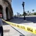 Un agente de la PNR impide el paso frente al Capitolio de La Habana, el 13 de julio. | Foto: Time