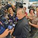 El arzobispo de Miami, Thomas Wenski, presta declaraciones en el aeropuerto de Miami, protegido por la policía local, momentos antes de partir hacia La Habana para asistir a la visita del papa Benedicto XVI a la Isla (2012). Foto: Rui Ferreira