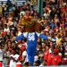 El León, la mascota de Industriales, confronta a los seguidores de Santiago de Cuba en el estadio Latinoamericano durante las semifinales de la 62 Serie Nacional de Béisbol. Foto: Ricardo López Hevia.