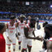 Jugadores de la selección de Cuba de baloncesto celebran tras vencer a Estados Unidos durante un partido clasificatorio a la AmeriCup 2025. Foto: Ernesto Mastrascusa/EFE.