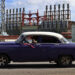 Un auto clásico pasa frente a una de las plantas turcas de generación eléctrica en el puerto de La Habana, durante los días del colapso del Sistema Electroenergético de Cuba. Foto: Ernesto Mastrascusa / EFE.