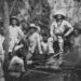 Escena en un campamento mambí donde los soldados asan un puerco. Foto: Archivo del autor.