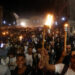 Jóvenes cubanos participan en la tradicional Marcha de las Antorchas en La Habana, el lunes 27 de enero de 2025. Foto: Ernesto Mastrascusa / EFE.